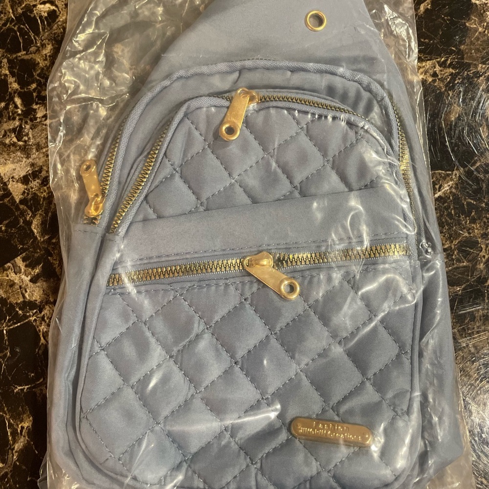 Quilted Blue Sling Bag with Gold Accents